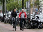 Amsterdam 30 juli 2011
Youp van t Hek en zijn zoon Julius op de fiets.
Peter Smulders bv