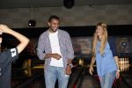 Amsterdam 22 juni 2012
Badr Hari bowlen met Maxim en Joelle Gullit en Estell Cruijff.
Peter Smulders bv