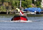 Vreeland 25 juli 2012
Maarten Spanjer met vriendin en Rene v d Gijp met vriendin aan het varen op de Vecht met sloep/boot Maarten.
Peter Smulders bv