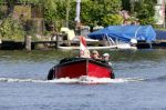 Vreeland 25 juli 2012
Maarten Spanjer met vriendin en Rene v d Gijp met vriendin aan het varen op de Vecht met sloep/boot Maarten.
Peter Smulders bv