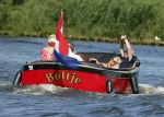 Vreeland 25 juli 2012
Maarten Spanjer met vriendin en Rene v d Gijp met vriendin aan het varen op de Vecht met sloep/boot Maarten.
Peter Smulders bv