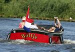 Vreeland 25 juli 2012
Maarten Spanjer met vriendin en Rene v d Gijp met vriendin aan het varen op de Vecht met sloep/boot Maarten.
Peter Smulders bv