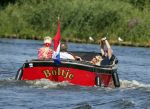 Vreeland 25 juli 2012
Maarten Spanjer met vriendin en Rene v d Gijp met vriendin aan het varen op de Vecht met sloep/boot Maarten.
Peter Smulders bv