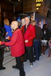 AMSTERDAM - Bij het Tuschinski Theater is de premiere van Behind the Candelabra. Met op de rode loper  Arjan Ederveen met partner.