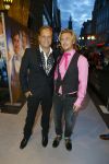 AMSTERDAM - Bij het Tuschinski Theater is de premiere van Behind the Candelabra. Met op de rode loper  Carlo Boszhard met partner