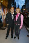 AMSTERDAM - Bij het Tuschinski Theater is de premiere van Behind the Candelabra. Met op de rode loper  Carlo Boszhard met partner