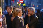 AMSTERDAM - Bij het Tuschinski Theater is de premiere van Behind the Candelabra. Met op de rode loper  Derek Ogilvie met Paul Turner