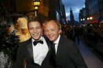 AMSTERDAM - Bij het Tuschinski Theater is de premiere van Behind the Candelabra. Met op de rode loper  Derek Ogilvie met partner.