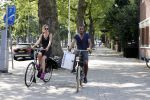 Amsterdam 23 juli 2013
Doutzen Kroes en Sunnery James op de fiets in Amsterdam.
Peter Smulders bv