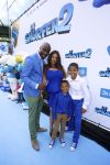 AMSTERDAM - Bij PathÃ© ArenA is de filmpremiÃ¨re De Smurfen II. Met op de foto  Fernando Halman met partner en kinderen.