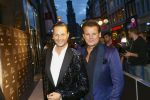 AMSTERDAM - Bij het Tuschinski Theater is de premiere van Behind the Candelabra. Met op de rode loper  Fred v Leer en Leco v Zadelhoff