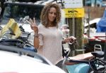 Amsterdam 9 augustus 2013
Glennis Grace op haar Vespa scooter in Amsterdam zuid. 
Peter Smulders bv