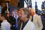 AMSTERDAM - Bij het Tuschinski Theater is de premiere van Behind the Candelabra. Met op de rode loper  Hans v Willigenburg.