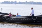 Loosdrecht 22 juli 2013
Ronnie Tober en Jan Jochems op boot varen op de vecht.
Peter Smulders bv