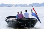 Loosdrecht 22 juli 2013
Ronnie Tober en Jan Jochems op boot varen op de vecht.
Peter Smulders bv
