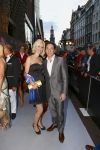 AMSTERDAM - Bij het Tuschinski Theater is de premiere van Behind the Candelabra. Met op de rode loper  Spiros Chalos met partner Lisa Chalos-Oostwoud.