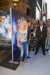 AMSTERDAM - Bij het Tuschinski Theater is de premiere van Behind the Candelabra. Met op de rode loper  Winston Post is met partner Denise van Rijswijk.