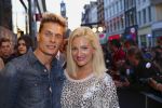 AMSTERDAM - Bij het Tuschinski Theater is de premiere van Behind the Candelabra. Met op de rode loper  Winston Post is met partner Denise van Rijswijk.