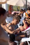ibiza 28 juli 2015
Estelle Cruijff Joelle Gullit Lilly Becker met zoon Amadues Becker en een zoon uit een eerder huwelijk van Boris op het strand van Talamanca.