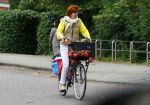 Amsterdam 20 juni 2015  
Chazia Mourali en haar man Mark Schroder op de fiets in amsterdam.