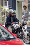 Amsterdam 14 augustus 2015  
Edgar Davids op zijn old timer motor in amsterdam zuid. Motor heeft de naam Pitbull