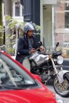 Amsterdam 14 augustus 2015  
Edgar Davids op zijn old timer motor in amsterdam zuid. Motor heeft de naam Pitbull
