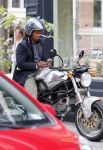 Amsterdam 14 augustus 2015  
Edgar Davids op zijn old timer motor in amsterdam zuid. Motor heeft de naam Pitbull