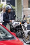 Amsterdam 14 augustus 2015  
Edgar Davids op zijn old timer motor in amsterdam zuid. Motor heeft de naam Pitbull