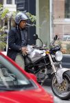 Amsterdam 14 augustus 2015  
Edgar Davids op zijn old timer motor in amsterdam zuid. Motor heeft de naam Pitbull