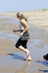 Wassenaar 10 juli 2015
Fotouurtje met Koningin Maxima Koning Willem Alexander en de prinsesjes Amalia Alexia en Ariane op het strand van Wassenaar.