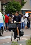 Amsterdam 12 augustus 2015 
Susan Visser met hondje op de fiets.