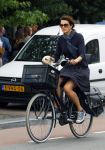 Amsterdam 12 augustus 2015 
Susan Visser met hondje op de fiets.