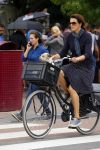 Amsterdam 12 augustus 2015 
Susan Visser met hondje op de fiets.