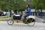 Amsterdam 20 juni 2015  
Susan Visser met hondje in bakfiets.