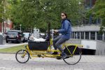 Amsterdam 20 juni 2015  
Susan Visser met hondje in bakfiets.