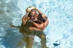 ibiza 27 juli 2015
Sylvie Meis Damian v d Vaart en vriend Momo in het zwembad van Las Boas op ibiza aan de haven