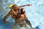 ibiza 27 juli 2015
Sylvie Meis Damian v d Vaart en vriend Momo in het zwembad van Las Boas op ibiza aan de haven