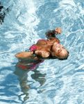 ibiza 27 juli 2015
Sylvie Meis Damian v d Vaart en vriend Momo in het zwembad van Las Boas op ibiza aan de haven