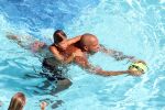 ibiza 27 juli 2015
Sylvie Meis Damian v d Vaart en vriend Momo in het zwembad van Las Boas op ibiza aan de haven