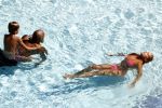ibiza 27 juli 2015
Sylvie Meis Damian v d Vaart en vriend Momo in het zwembad van Las Boas op ibiza aan de haven