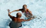 ibiza 27 juli 2015
Sylvie Meis Damian v d Vaart en vriend Momo in het zwembad van Las Boas op ibiza aan de haven