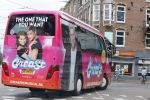 Amsterdam 15 augustus 2015
Tim Douwsma en  VajÃ¨n van den Bosch de hoofdrolspelers van de musical Grease staan groot op de bus