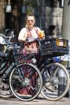 Amsterdam 1 juli 2015 
Trijntje Oosterhuis zwanger met fiets en een vriendin