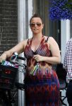 Amsterdam 1 juli 2015 
Trijntje Oosterhuis zwanger met fiets en een vriendin