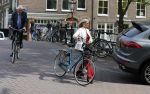 Amsterdam 10 augustus 2015     
Wim en Rita Kok op de fiets in Amsterdam.