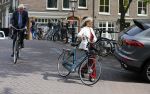 Amsterdam 10 augustus 2015     
Wim en Rita Kok op de fiets in Amsterdam.
