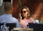Amsterdam 11 augustus 2015
Winonah de Jong de jong met haar PA op terras