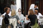 Amsterdam 17 juli 2016 
Edgar davids op terras met verschillende dames.
