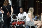 Amsterdam 17 juli 2016 
Edgar davids op terras met verschillende dames.
