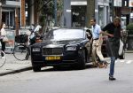Amsterdam 23 juli 2016 
Advocaat Gerard Spong met zijn Rolls Royce en zijn hondje